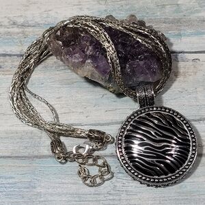 Premier Designs Necklace with Zebra Pendant.